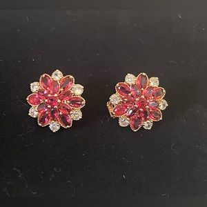 Beautiful gold plated pink/Ruby colored faux gemstones clip on earrings.
